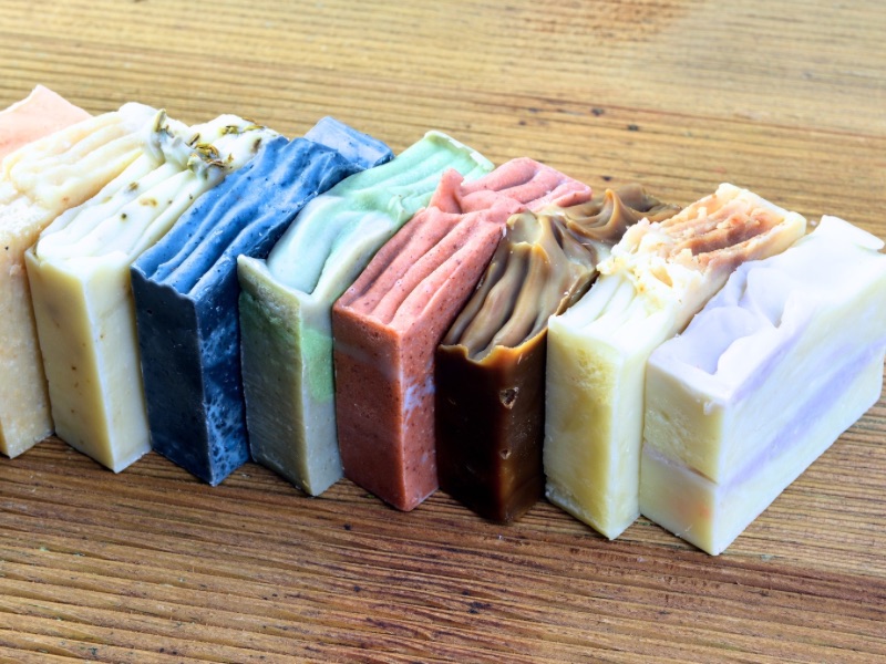 Stack of colorful handmade soaps.