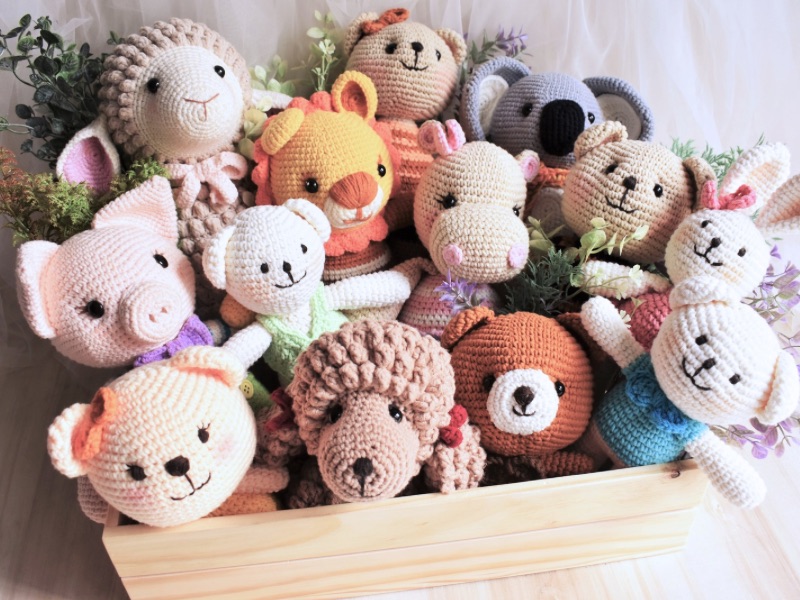Crochet plushies in a box.
